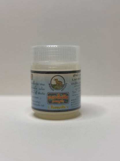 Jar of Lao Herbal Remedy Kanoukham Peppermint balm with a label on a white background