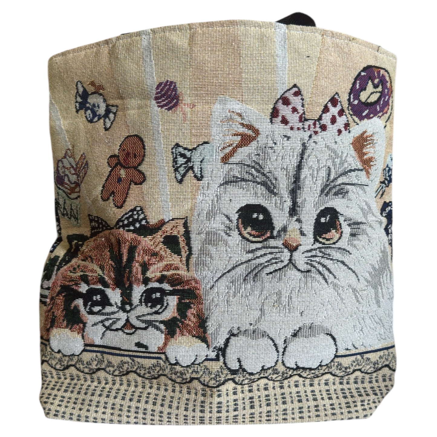 Tote bag with cat designs on a beige background