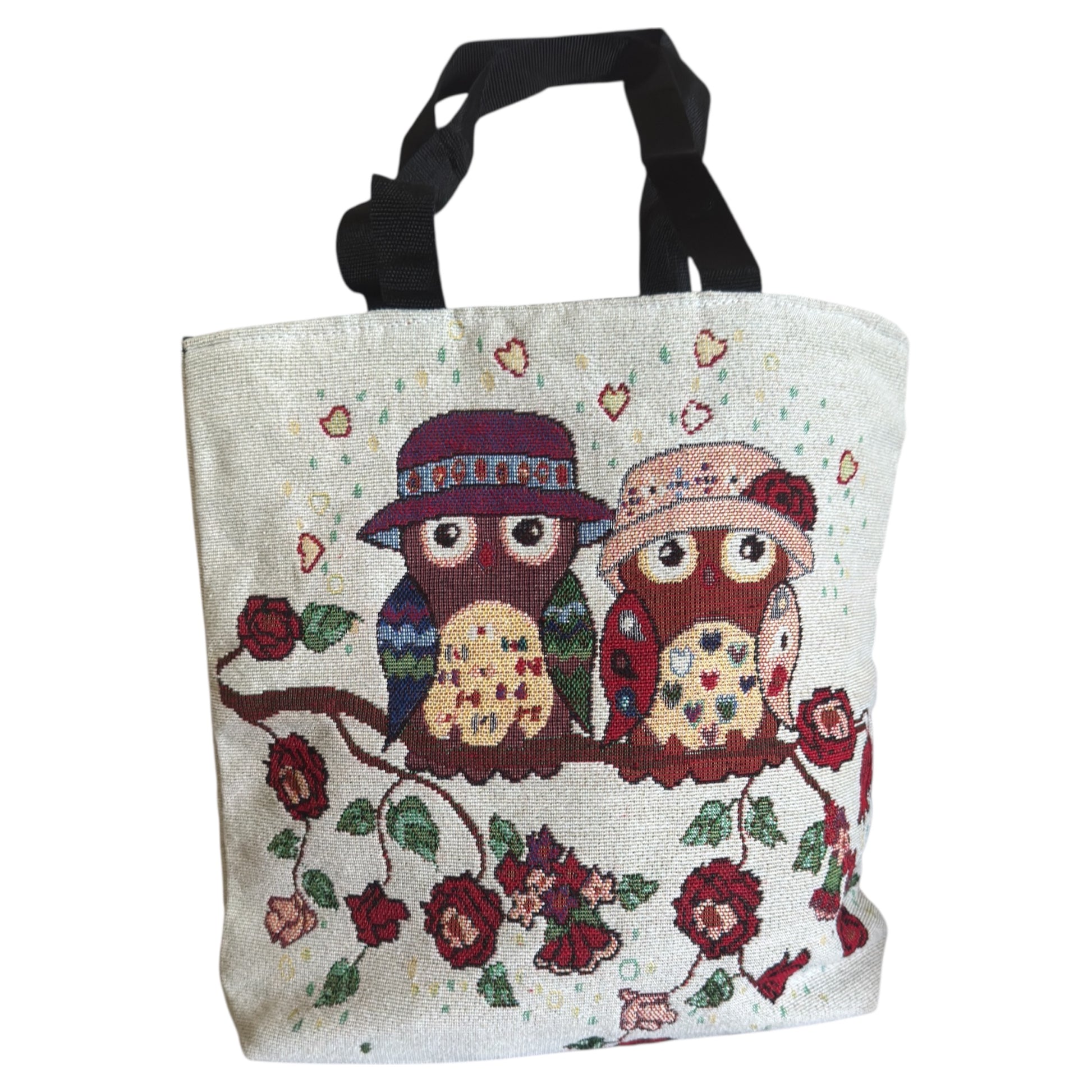 hand embroidery of two owl on branch with flowers and hearts